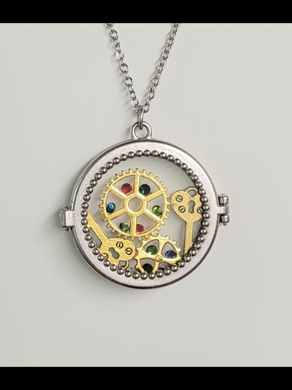 Silver and Gold Steampunk Gear Locket Necklace with Multicolor Accents